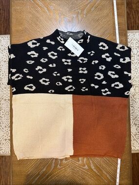 Andree Leopard Colorblock Crew Sweater in Black, Cream & Rust